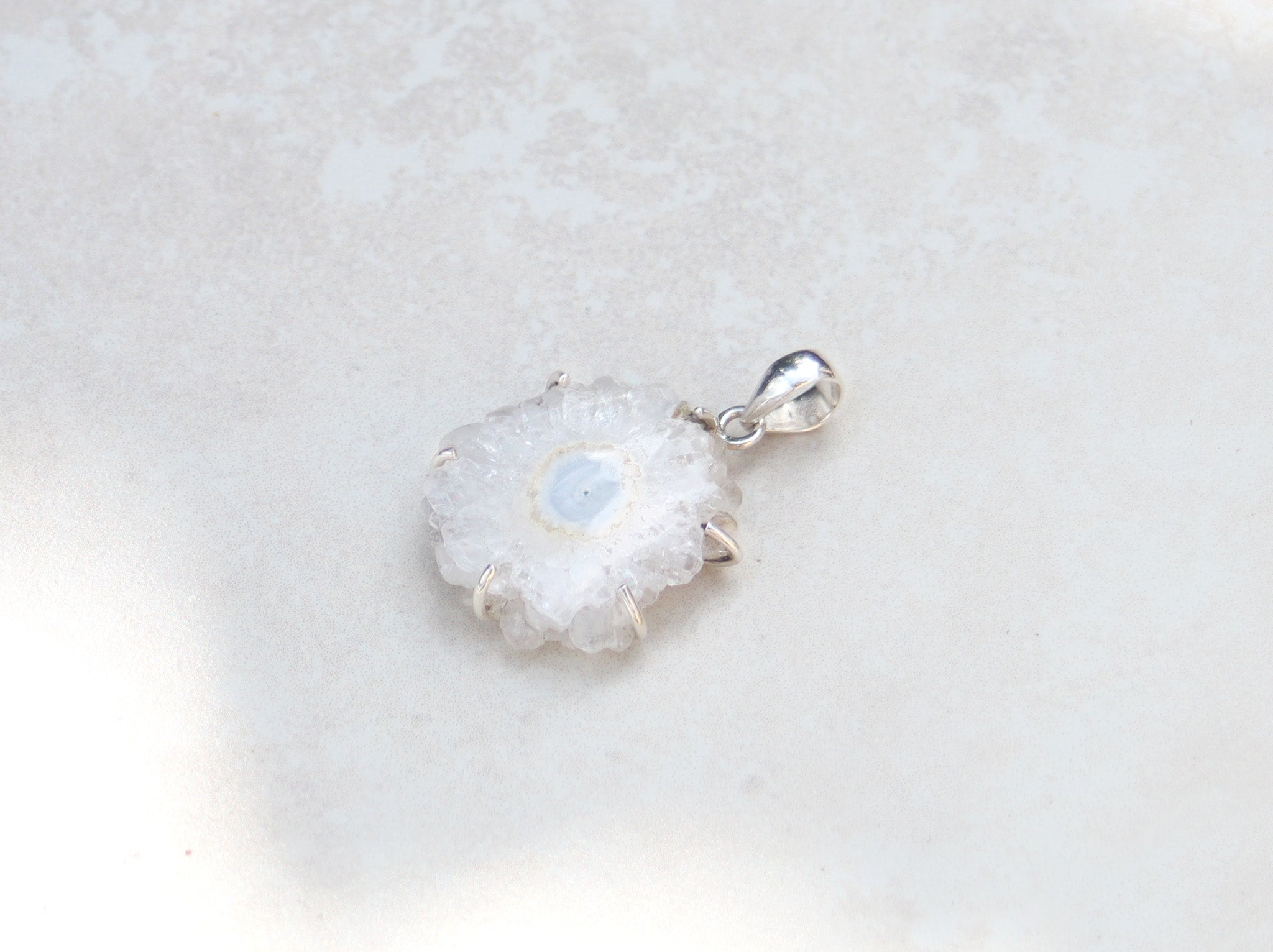 Silver quartz flower pendant