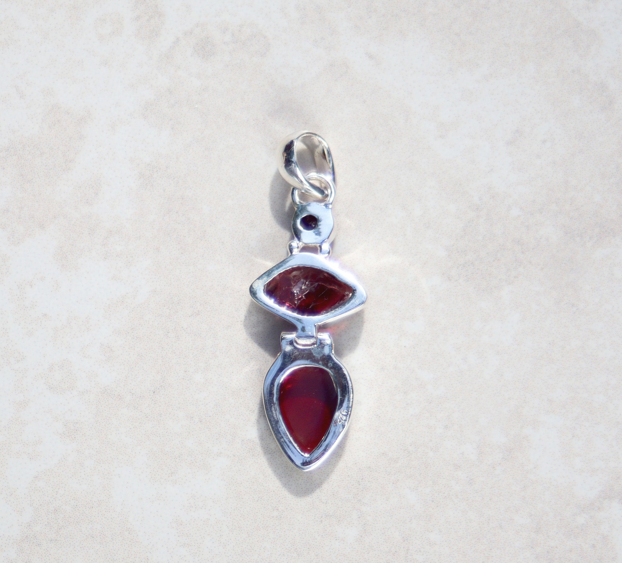 Silver terzetto garnet pendant