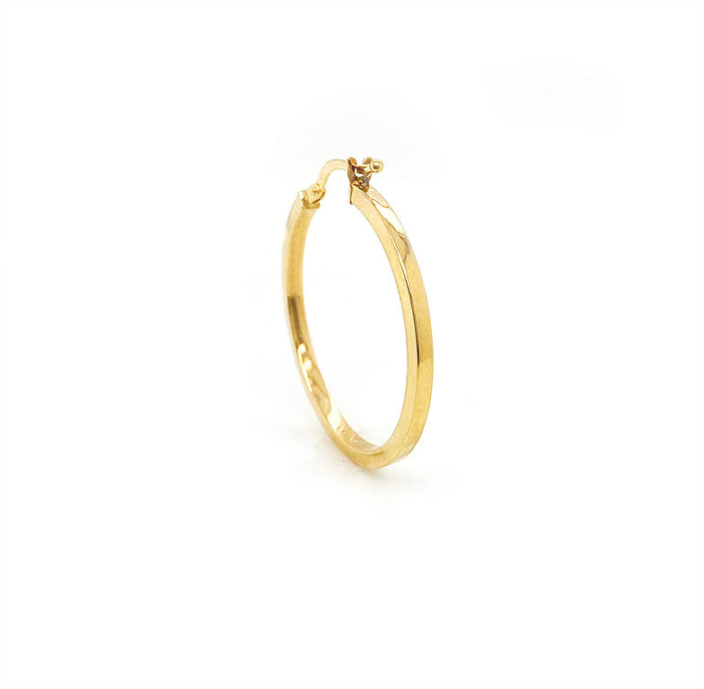 Classic 9kt yellow gold hoop earrings. These hoops are medium sized measuring 36 mm in diameter