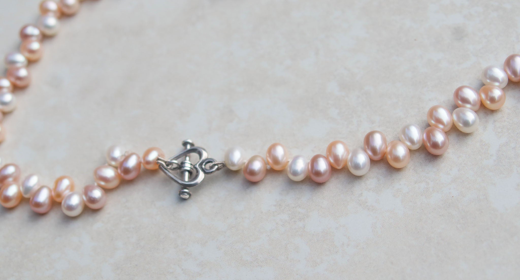 Princess pearl necklace with heart lock