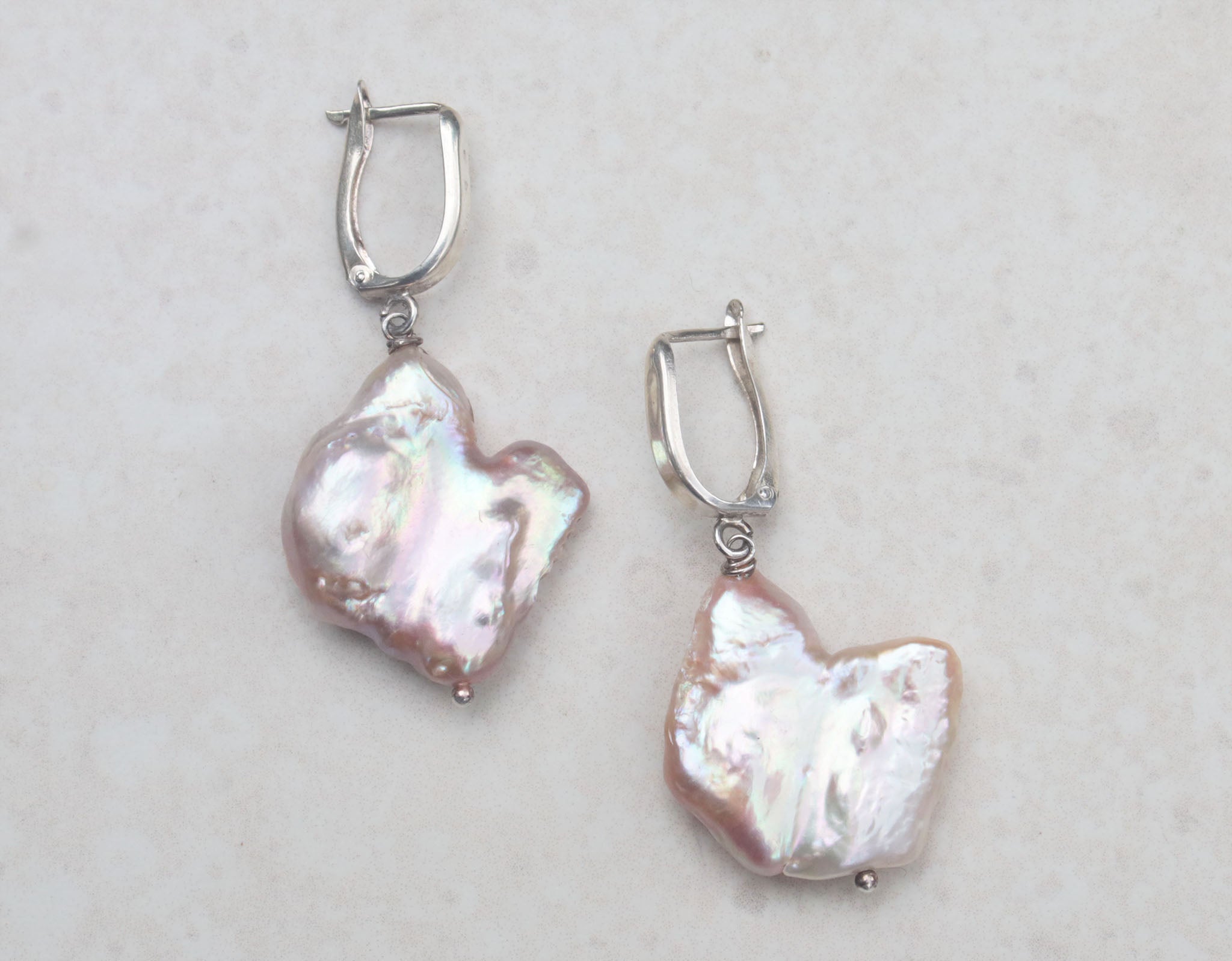 Silver baroque pearl earrings
