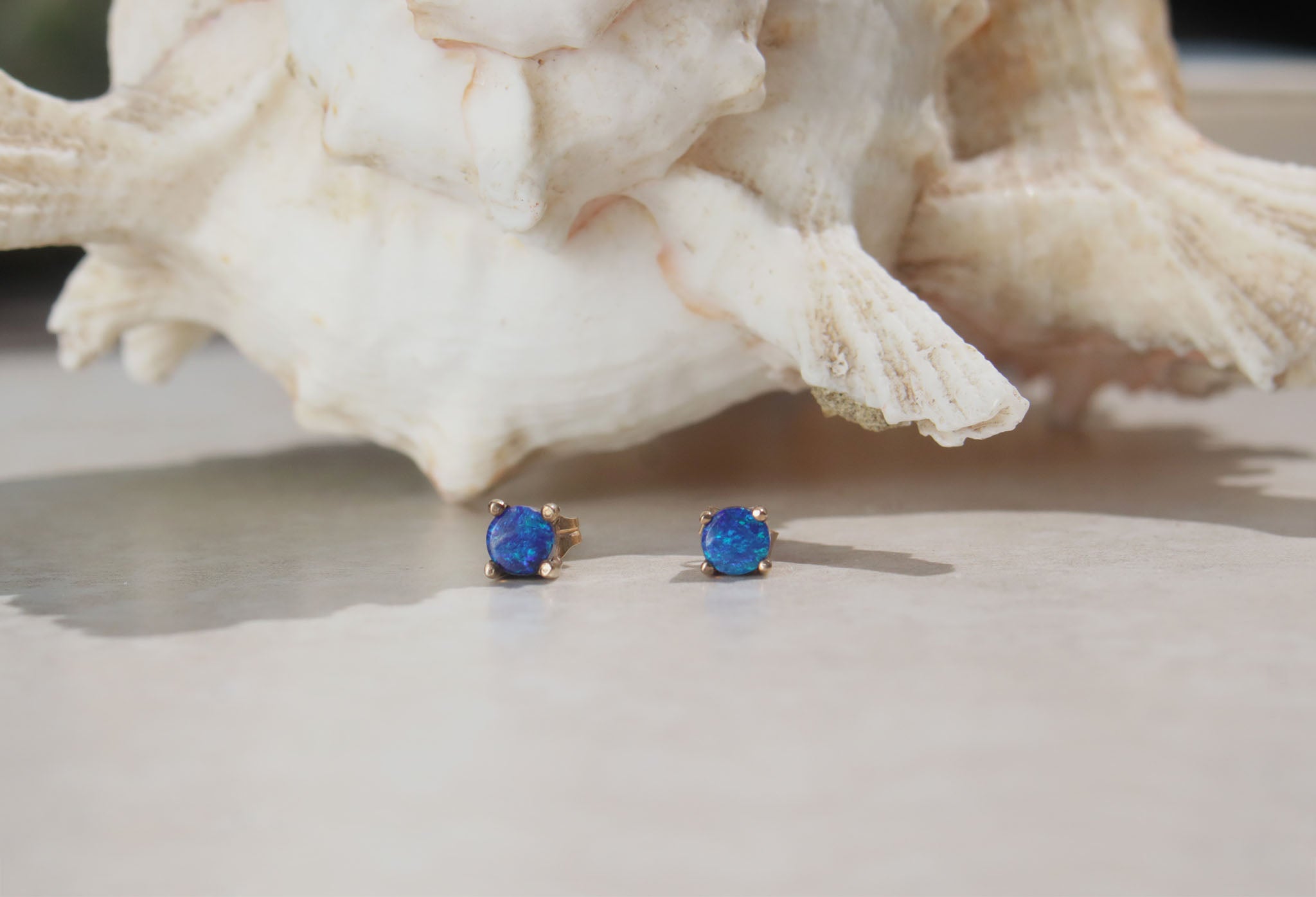 9ct yellow gold Australian blue opal studs