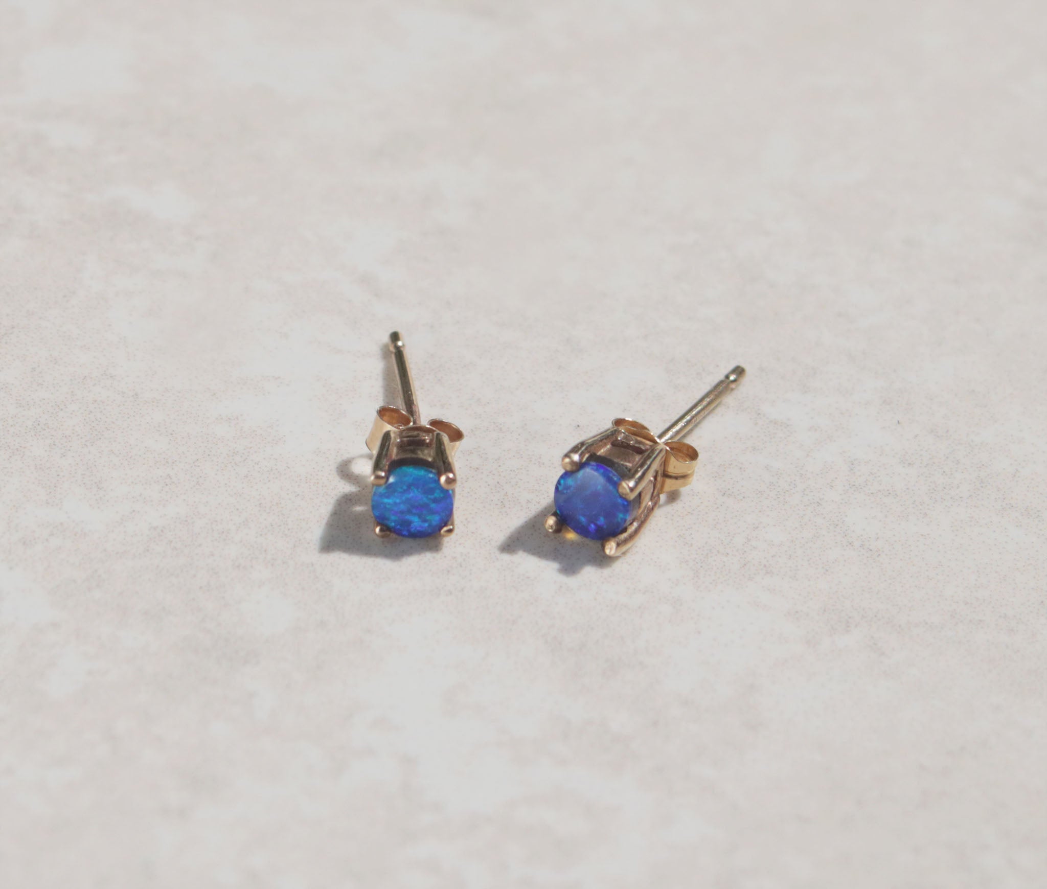 9ct yellow gold Australian blue opal studs