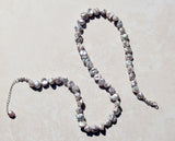 Silver Baroque pearl necklace.