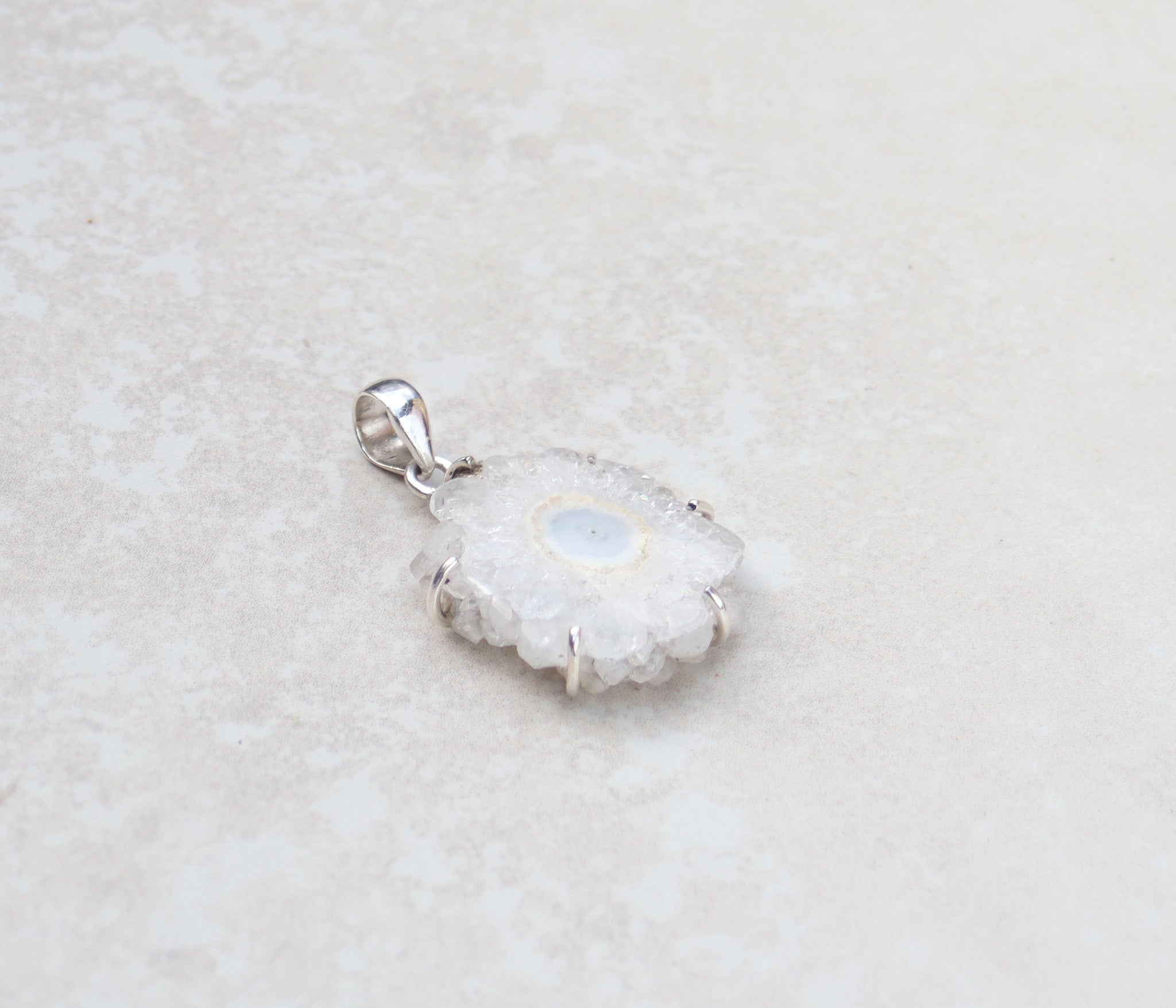 Silver quartz flower pendant