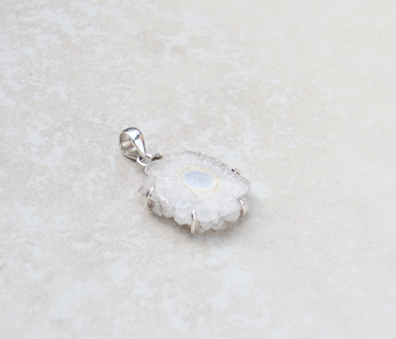 Silver quartz flower pendant