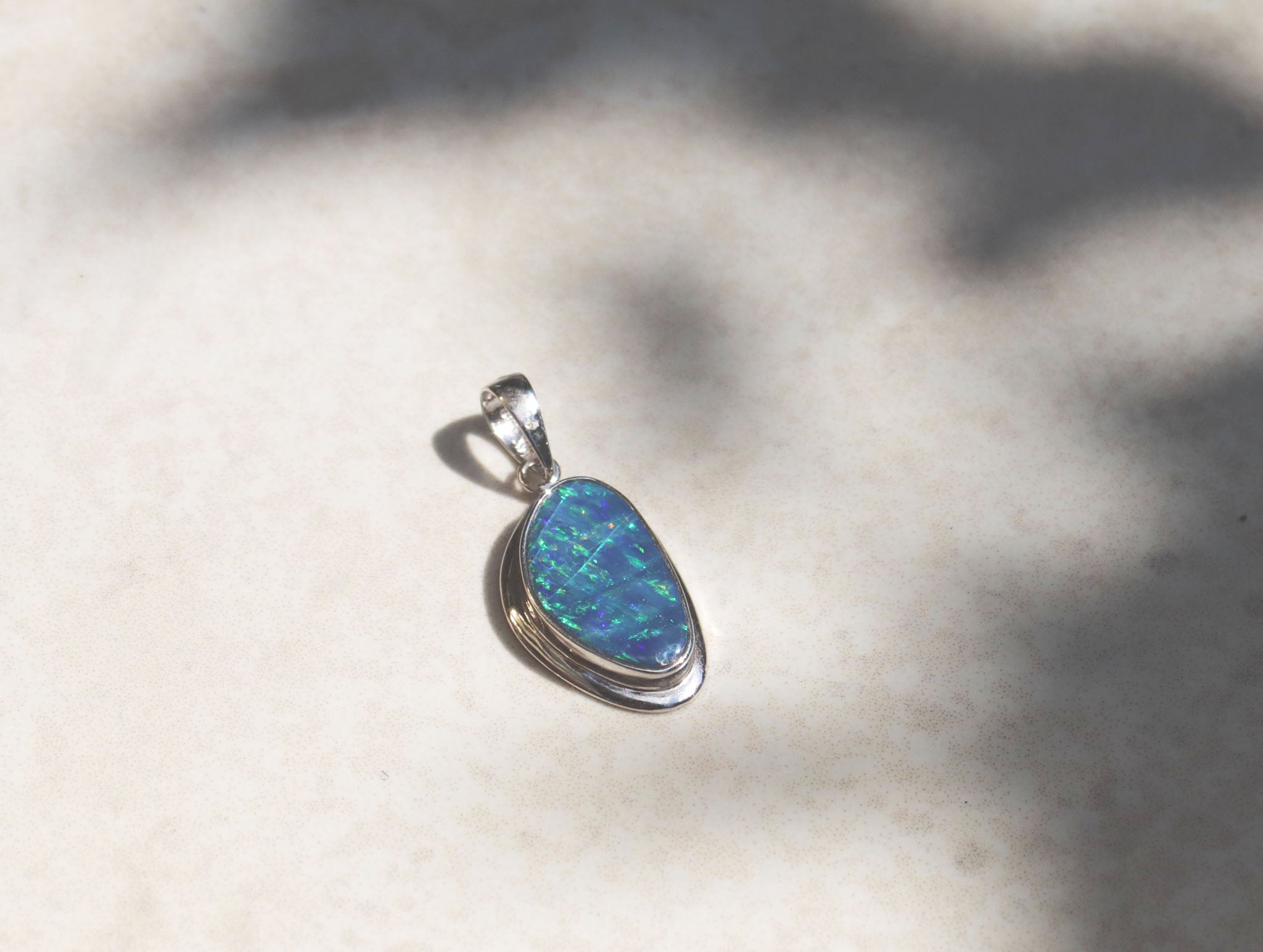 silver irregular shaped Australian blue opal pendant 