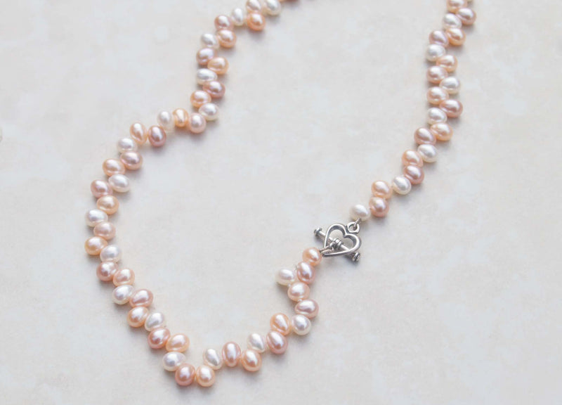 Princess pearl necklace with heart lock